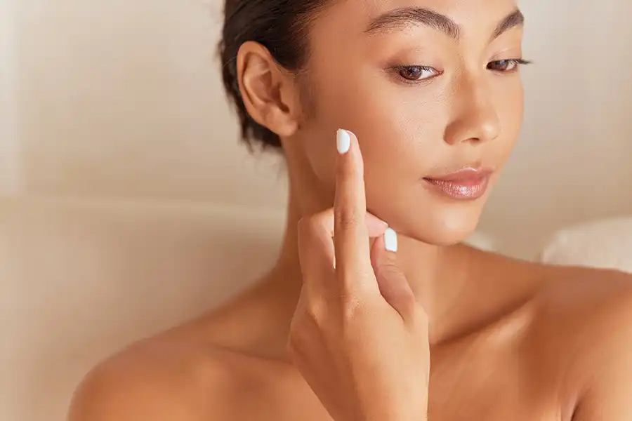 Aesthetic specialist performing advanced collagen skin treatment in Dubai
