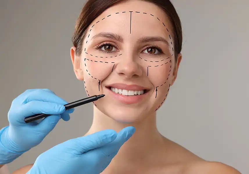 Aesthetic doctor performing facial mapping for non-surgical facial contouring in Dubai.