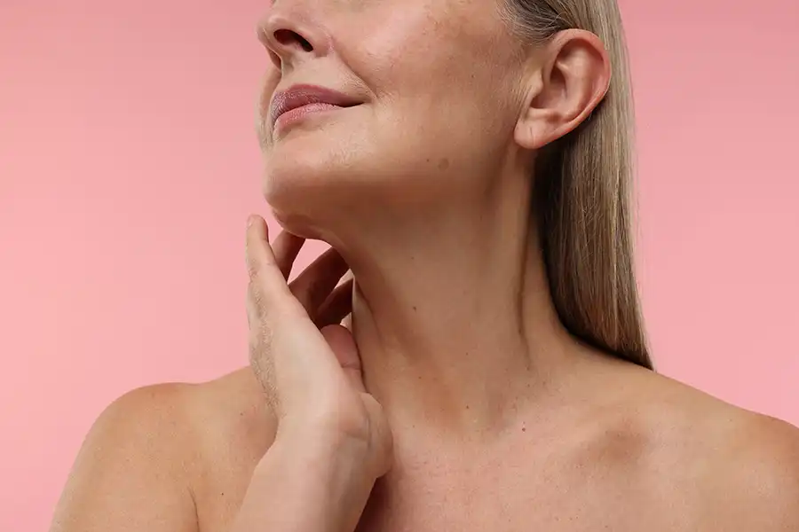 Specialist performing targeted skin tightening treatment in Jumeirah 3